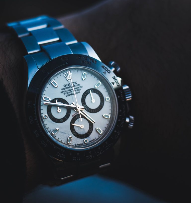 Rolex watch on mans wrist