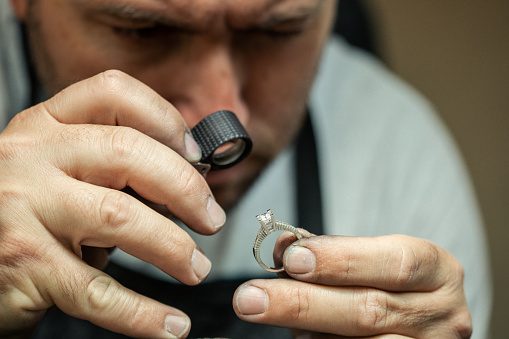 examining and controlling quality of diamond ring in workshop