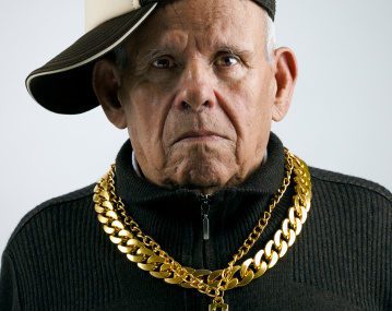 grandfather with a cap and golden chains